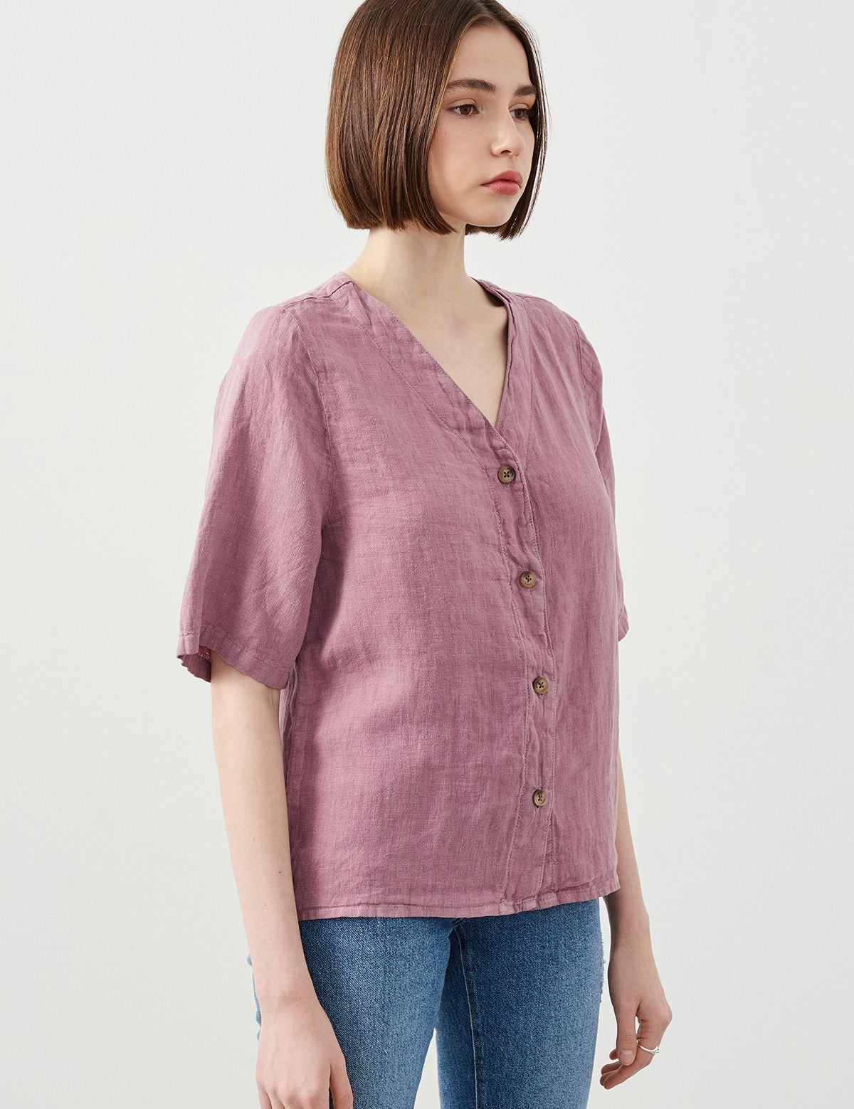 Close-Up of Linen Fabric Texture on Purple Shirt