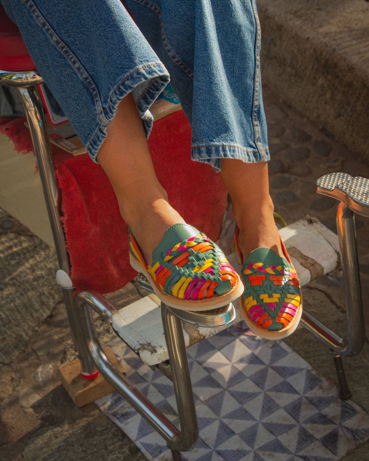 Close-up of the vibrant braided leather design of MEXAS loafers