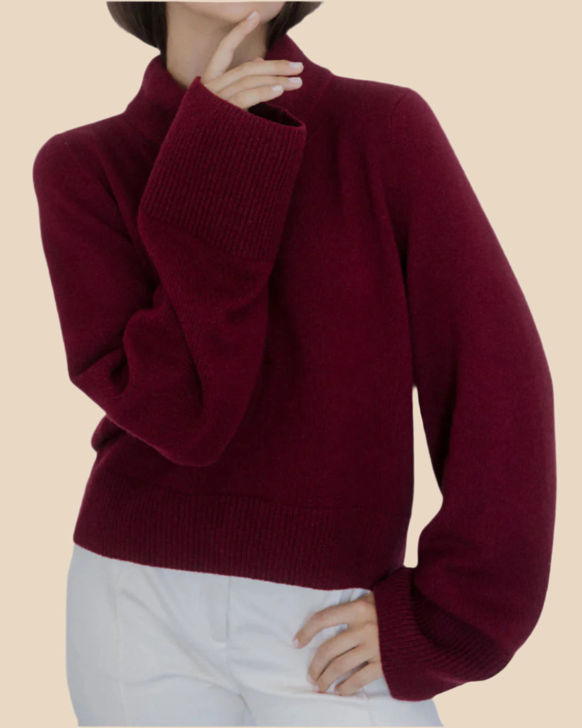 Wwomen’s burgundy wide-sleeve cashmere sweater by Nuage Cashmere, featuring a high neck and soft, knitted texture in a rich wine-red hue