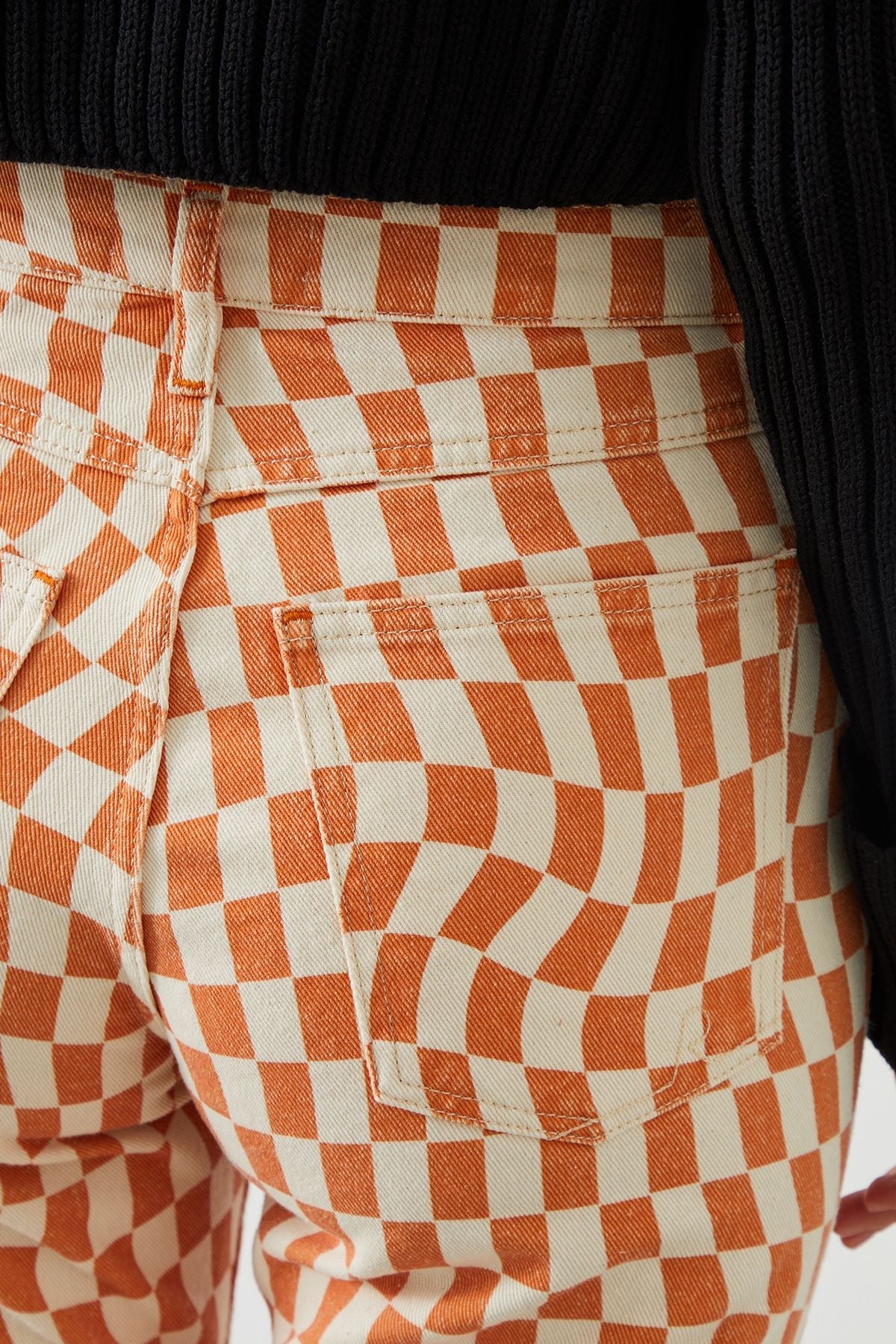Back view: Relaxed fit Mira Boyfriend Fit Checkered Jeans, crafted with sustainable denim.