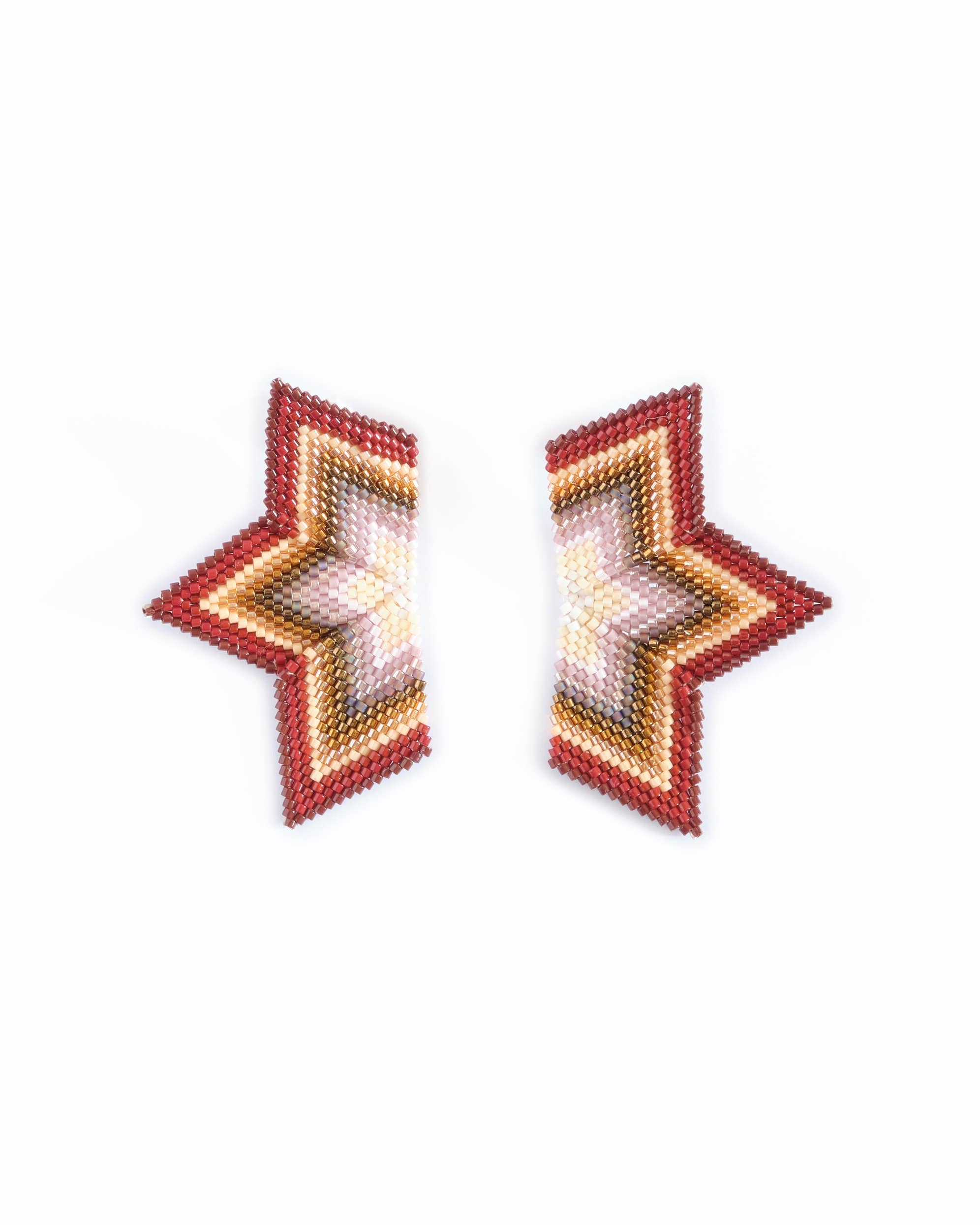 Handwoven half-star earrings in brown and cream, showcasing a vibrant gradient and carefully crafted beaded details