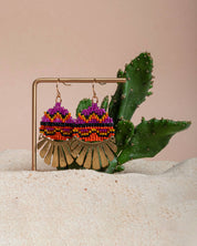 Mayana Designs Beaded Handwoven Santa Fe Drop Earrings on jewellery display highlighting the geometric pattern and vibrant colors.