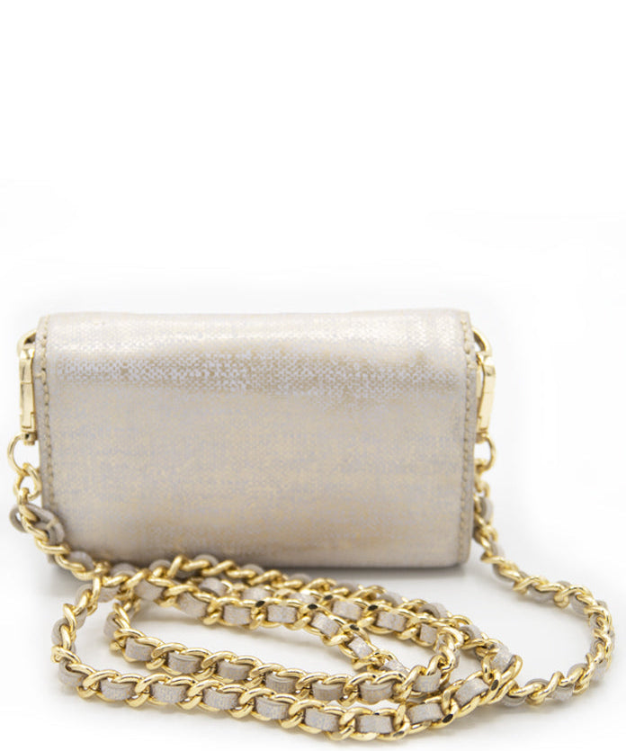 Elegant AETALIA Ary shoulder bag in ecru leather with braided gold chain and vintage gold accents.