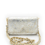 A front-facing view of the Ary Bag, showcasing its silver sheepskin leather and distinctive "A" cut-out design