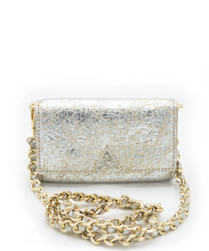 A front-facing view of the Ary Bag, showcasing its silver sheepskin leather and distinctive "A" cut-out design