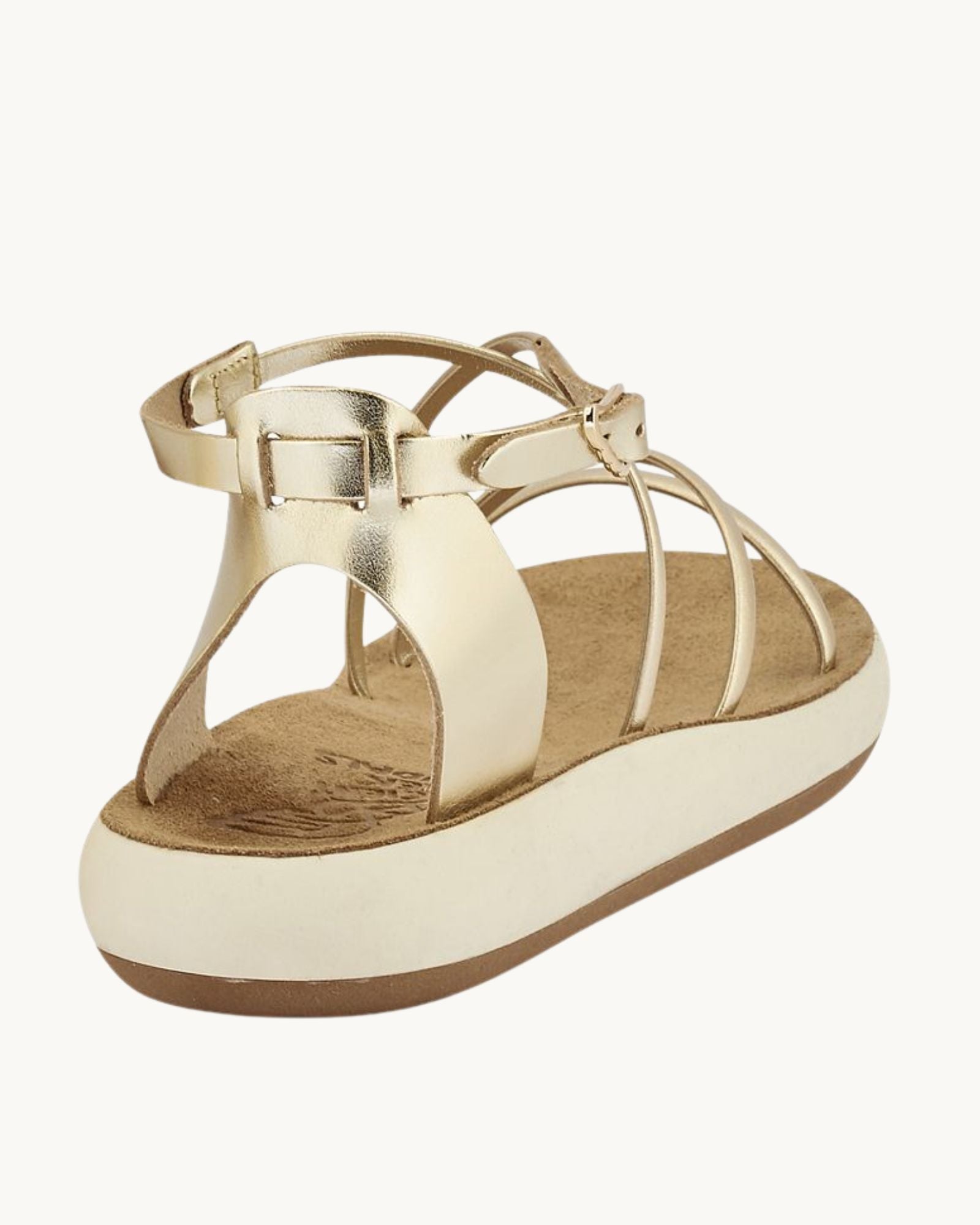 Back view of the Anastasia Comfort platinum sandal showing the adjustable ankle strap and heel