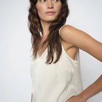 MMAstrid Silk Tank Top in ivory, side pose on model