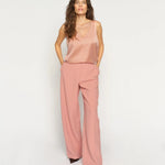 MMAstrid Silk Tank Top in peach with relaxed wide-leg trousers