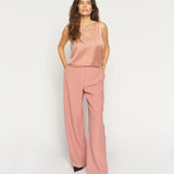 MMAstrid Silk Tank Top in peach with relaxed wide-leg trousers