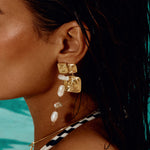 Luv AJ Seychelles Statement Earrings in gold on model