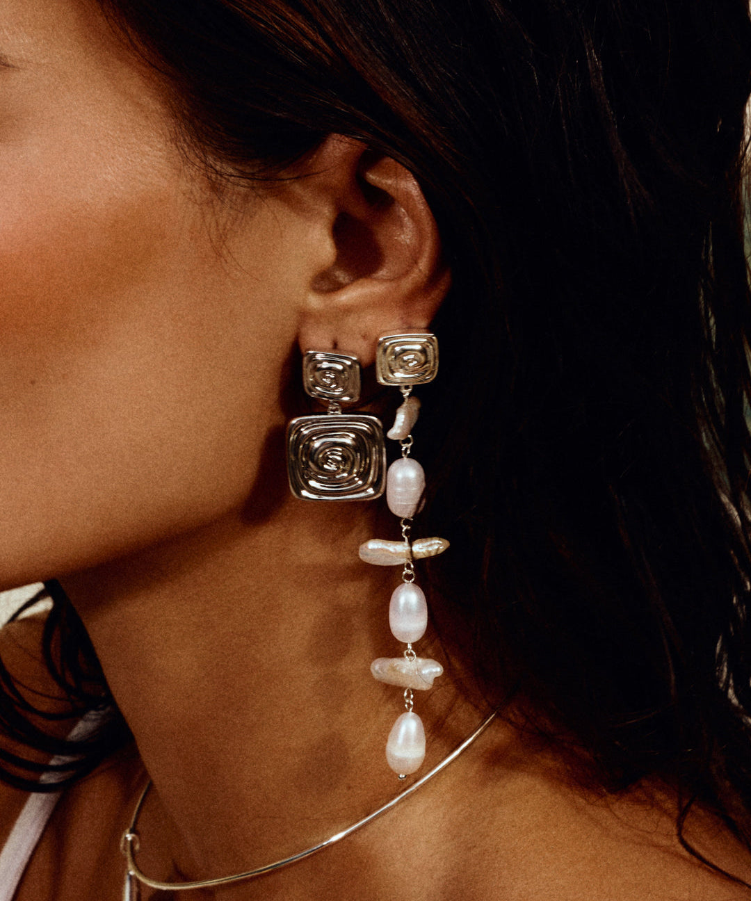 Luv AJ Seychelles Statement Earrings in silver on model