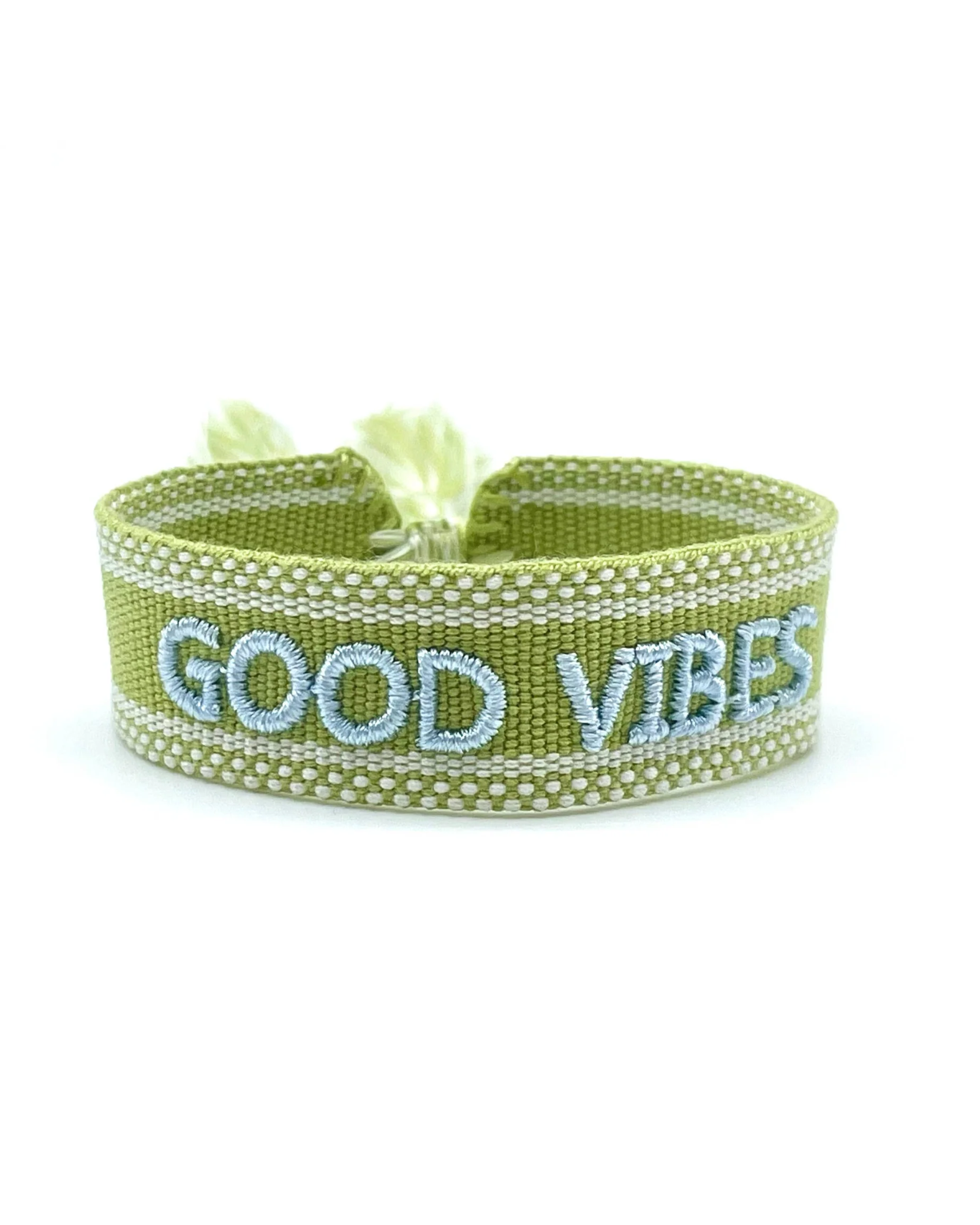 Close-up of adjustable cornflower blue woven bracelet with embroidered “LIVE LOVE SHINE” lettering and sliding knot tassel cords.