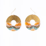 Mayana Designs Earth Ombre Fringe Disk Earrings, showcasing vibrant peach, orange, and turquoise beads with a hammered brass arch
