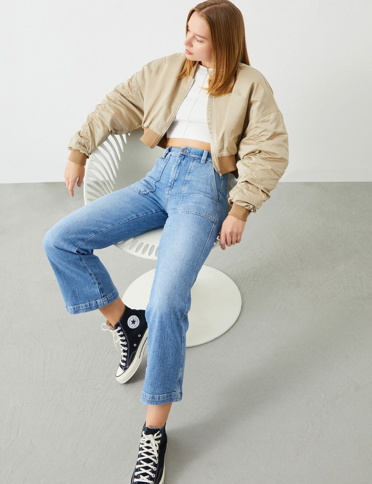 Model wearing Leyl Crop Flare Fit Jeans, showcasing their trendy and flattering silhouette.
