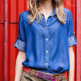 Adriana Festival Belt by Smitten styled with denim shirt, highlighting its neon colors and handwoven craftsmanship.