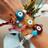 Aegean bandana bracelet with Greek Blue glass Mati evil eye and 24k gold accents