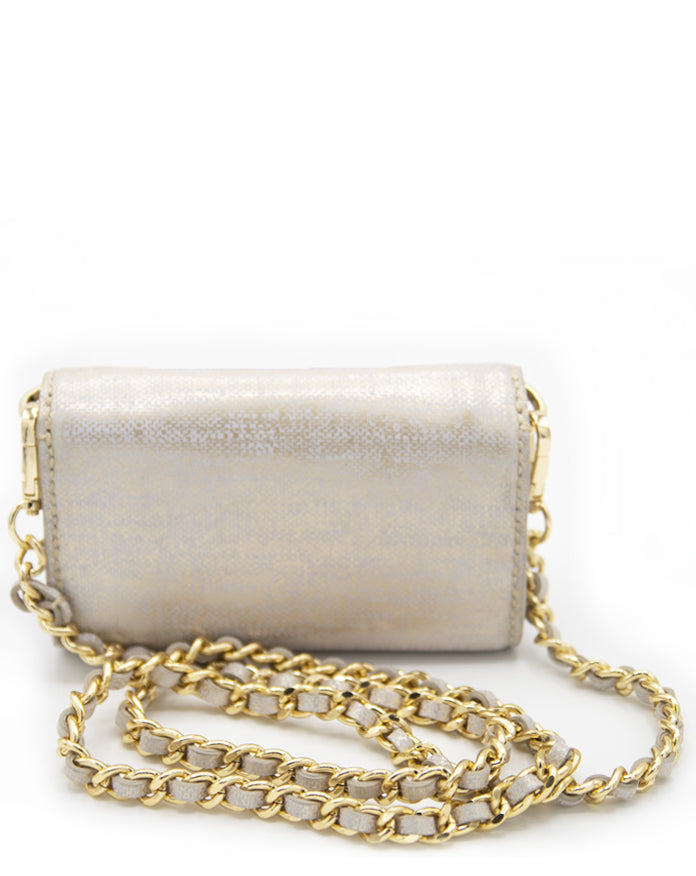 Elegant AETALIA Ary shoulder bag in ecru leather with braided gold chain and vintage gold accents.