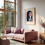 Parisian Door poster by All the Ways to Say framed in a bright living room with a pink sofa