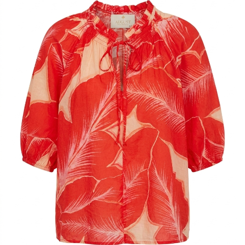 August orange and peach leaf-print blouse with ruffled tie neckline and puff sleeves