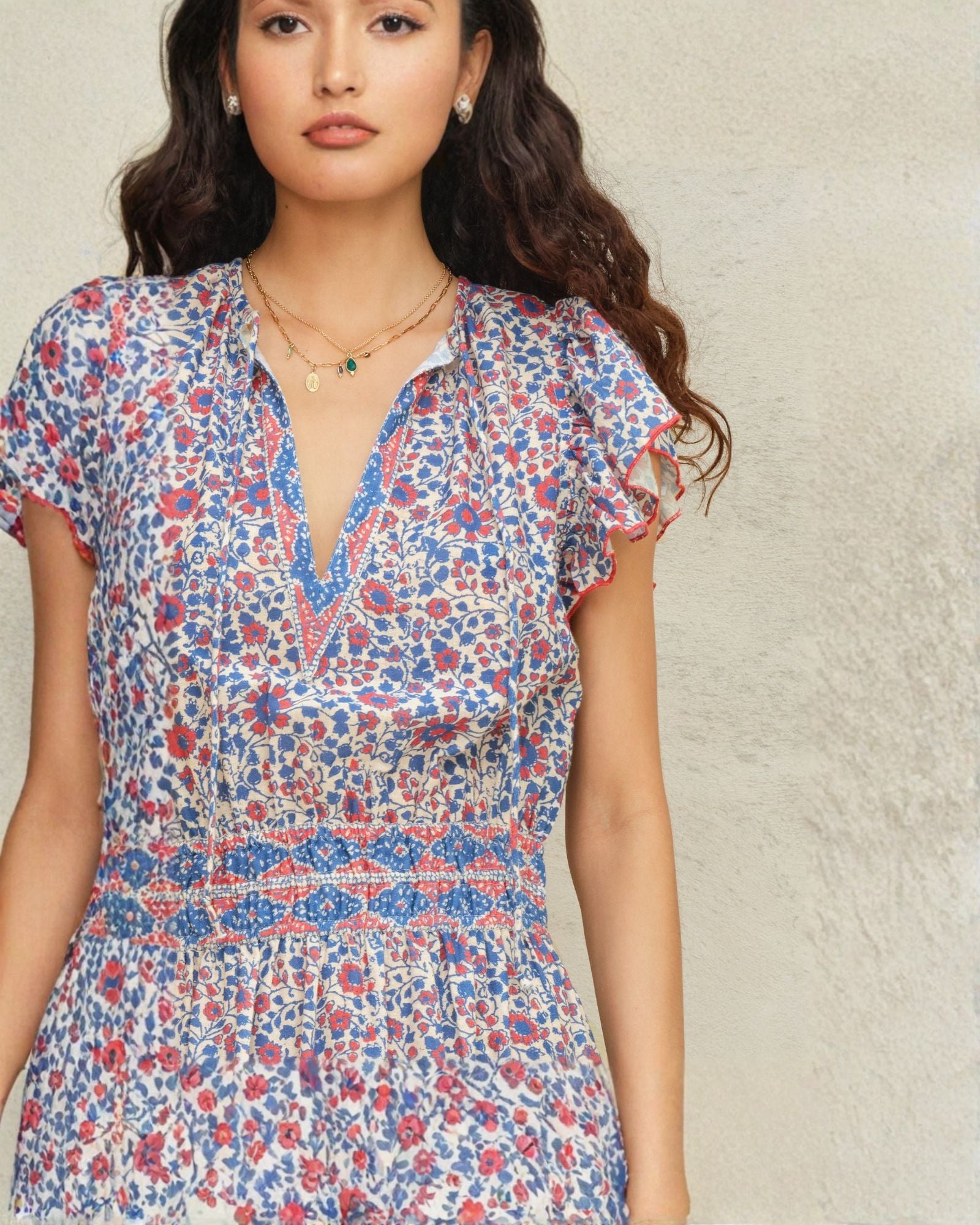 Elevated artisan cotton maxi dress by Mabe Apparel featuring pink and blue summer floral patterns.