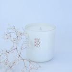 BYKOKO Edelweiss Bloom scented candle styled with dried flowers