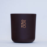 BYKOKO Havana Lovers scented candle in matt aubergine-brown glass