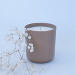 BYKOKO Noble Leather scented candle styled with dried flowers
