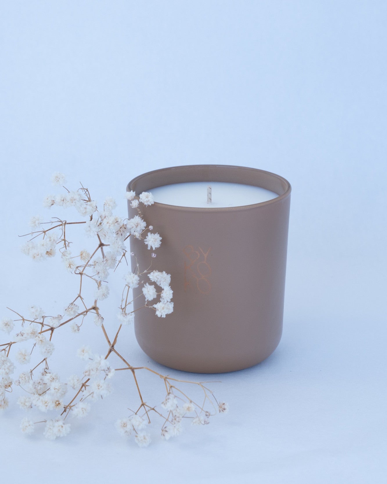 BYKOKO Noble Leather scented candle styled with dried flowers
