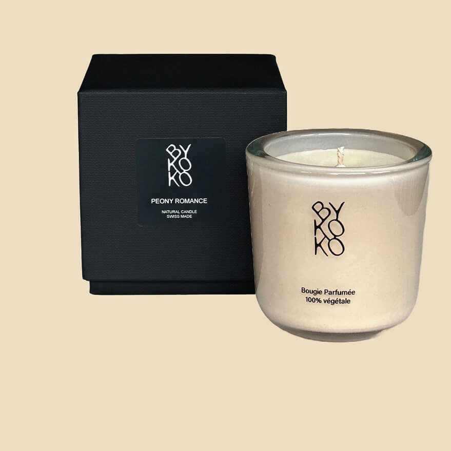 Bykoko Peony Romance 150g luxury candle in a unique hand-blown glass vessel. Artisanal Swiss-poured soy wax with wild berry, peony, and amber notes.