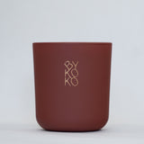 BYKOKO Peony Romance scented candle in matt terracotta glass