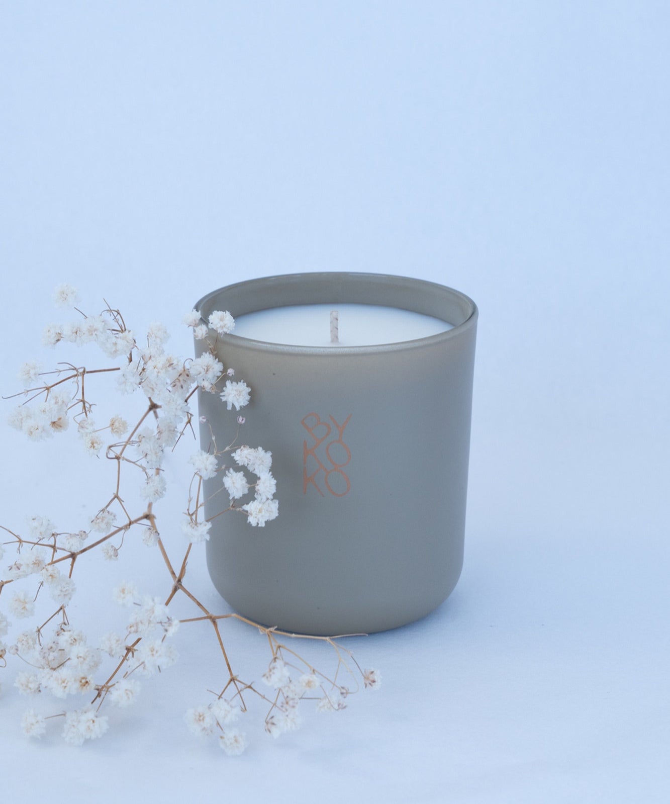 BYKOKO Serene Ritual scented candle styled with dried flowers