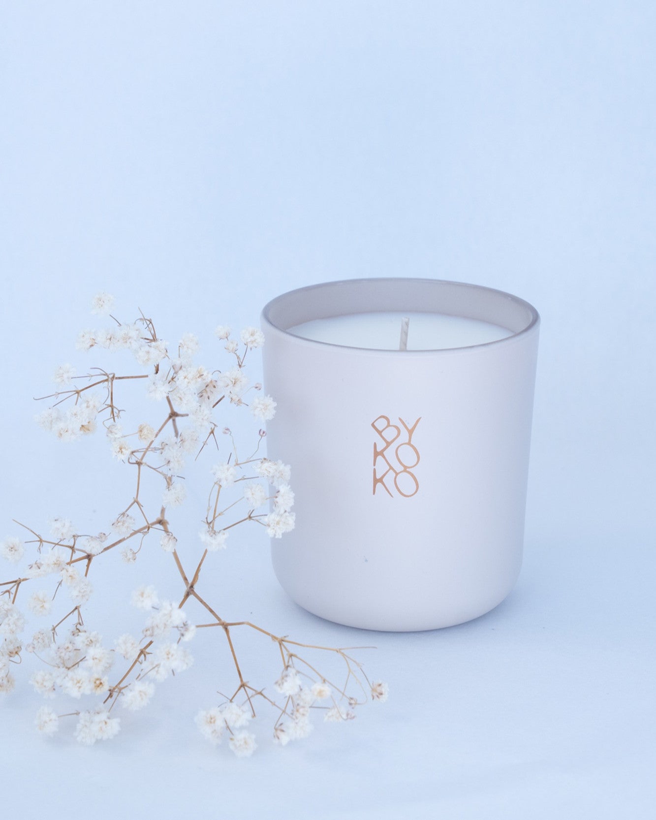 BYKOKO Tea Ceremony scented candle styled with dried flowers