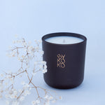 BYKOKO Velvet Santal scented candle styled with dried flowers