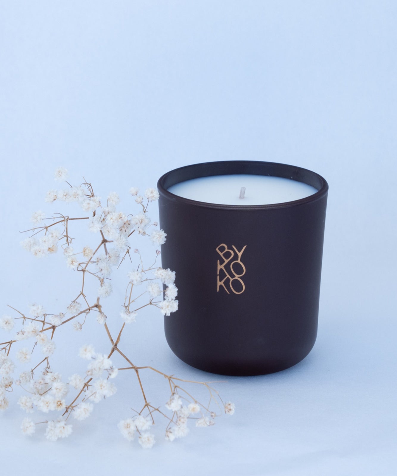 BYKOKO Velvet Santal scented candle styled with dried flowers