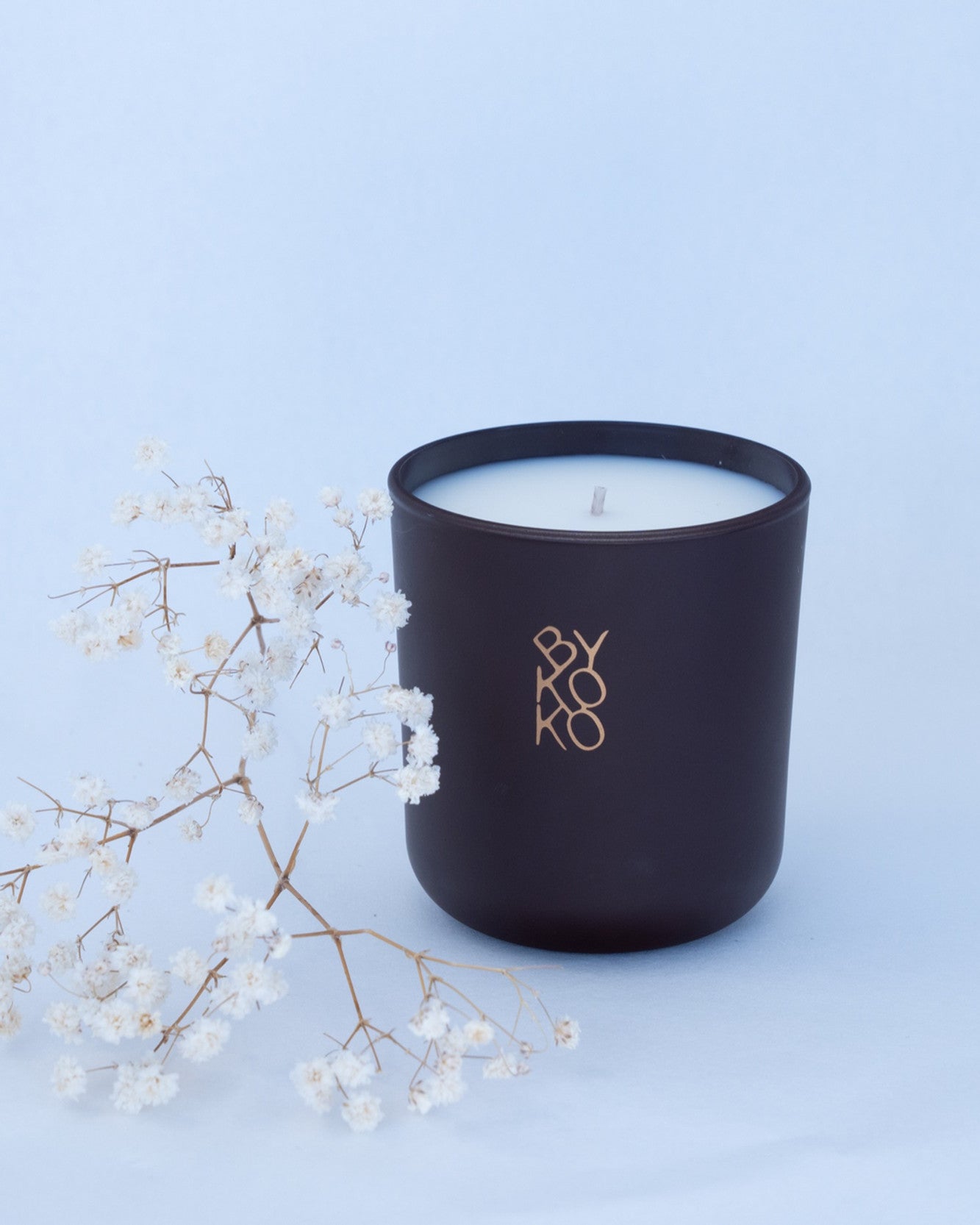 BYKOKO Velvet Santal scented candle styled with dried flowers