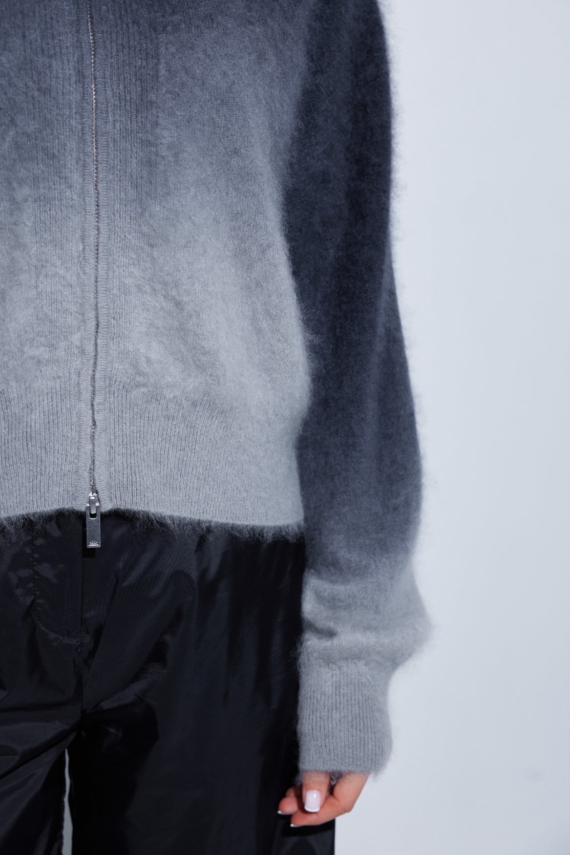 Close-up of the brushed knit and grey-to-black ombré of the C~RUSH Dip Toto jacket