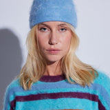 COLORUSH Byron beanie in Stonewash, worn with a multicoloured striped jumper