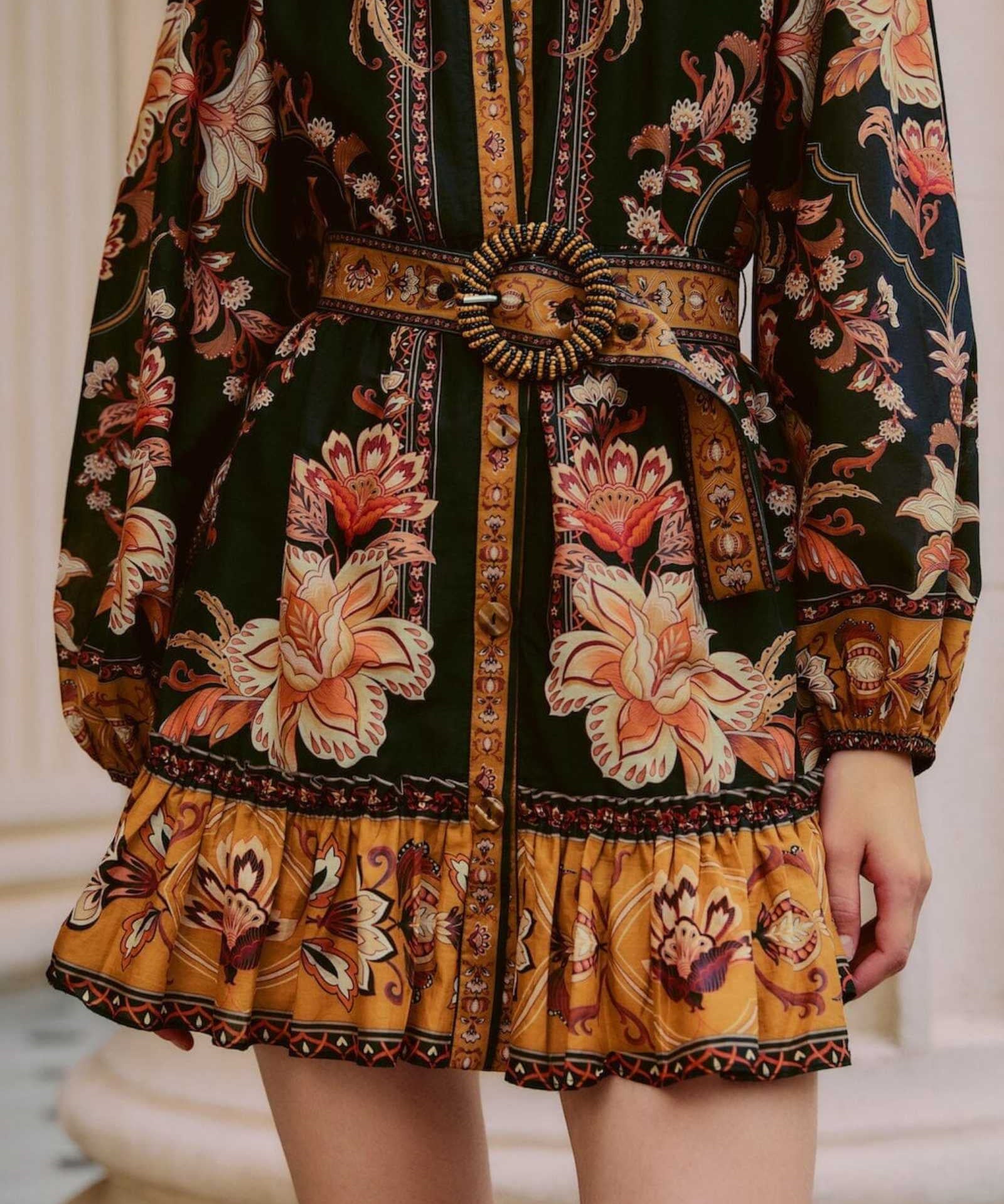 FARM Rio Black Majestic Garden Beaded Buckle Long Sleeve Mini Dress view featuring botanical print and elegant beaded buckle detail.