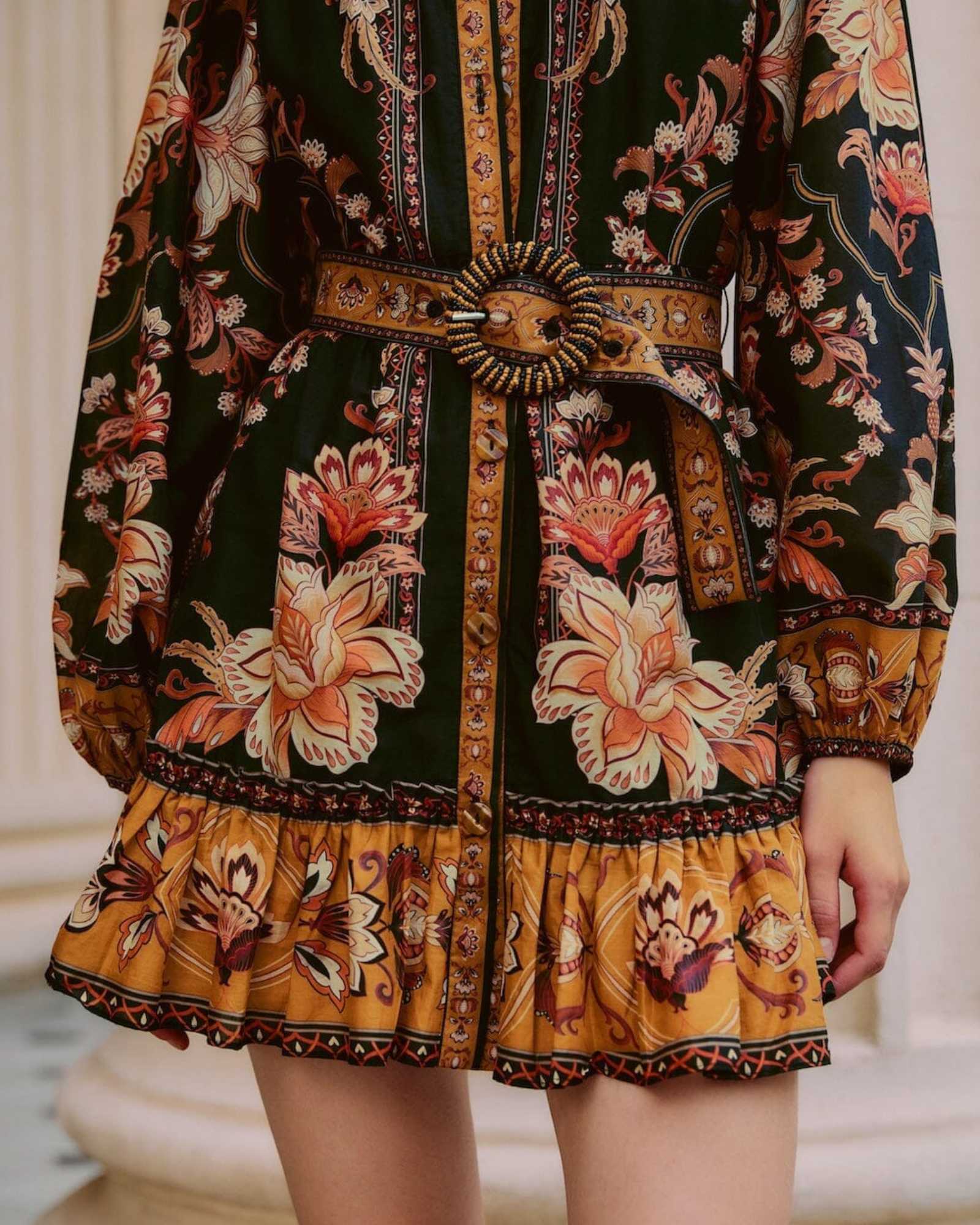 FARM Rio Black Majestic Garden Beaded Buckle Long Sleeve Mini Dress view featuring botanical print and elegant beaded buckle detail.
