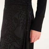 Close-up detail view of the Farm Rio maxi skirt, highlighting the embossed midnight leopard motif and the integrated invisible zipper at the side seam.