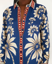 Close-up view of the Farm Rio Blue Luna pajama shirt, highlighting the classic notched collar, full button-down closure, and contrast printed cuffs.
