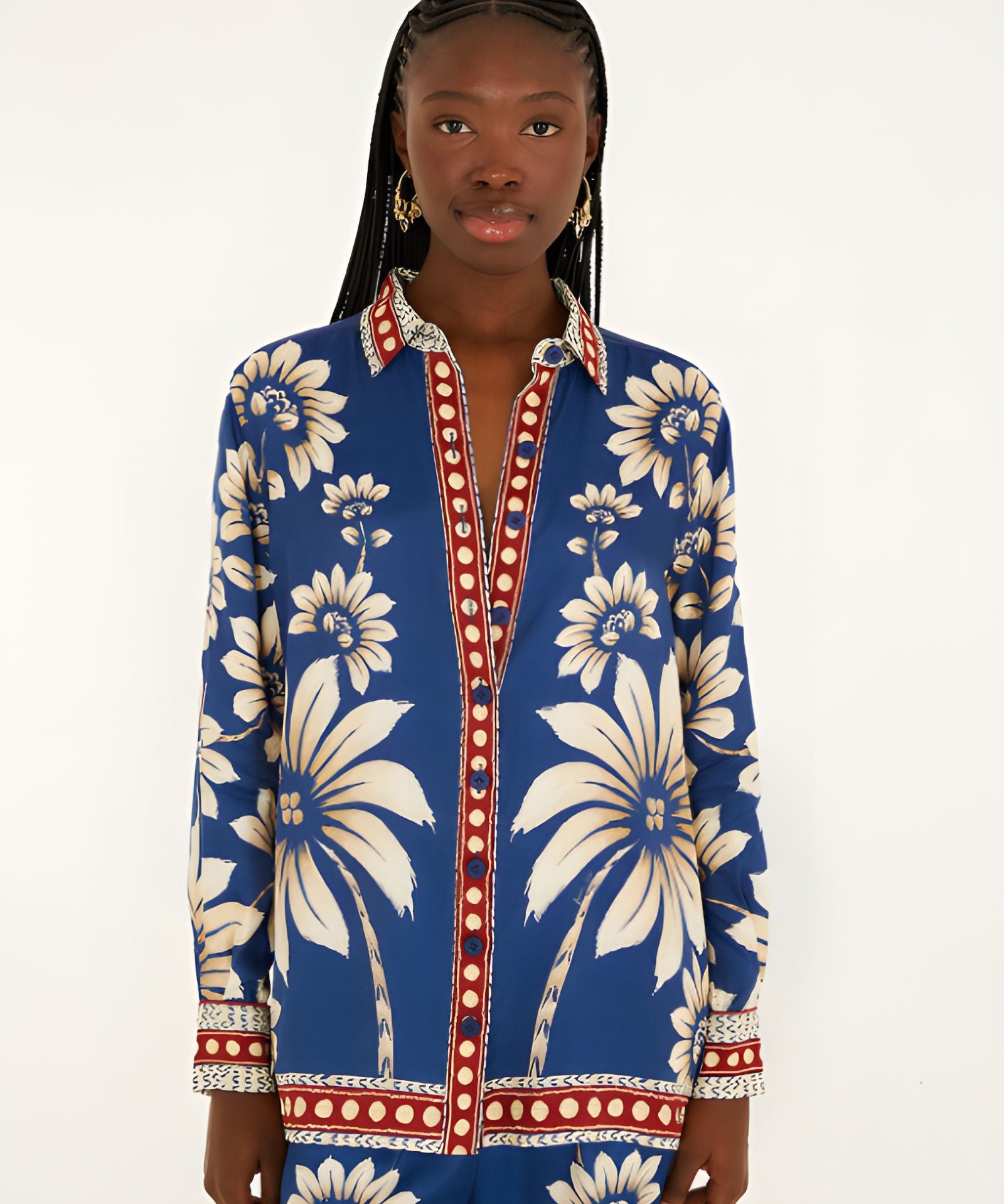 Front view of a model in a studio wearing the Farm Rio Blue Luna viscose pajama shirt with long sleeves and custom botanical print.