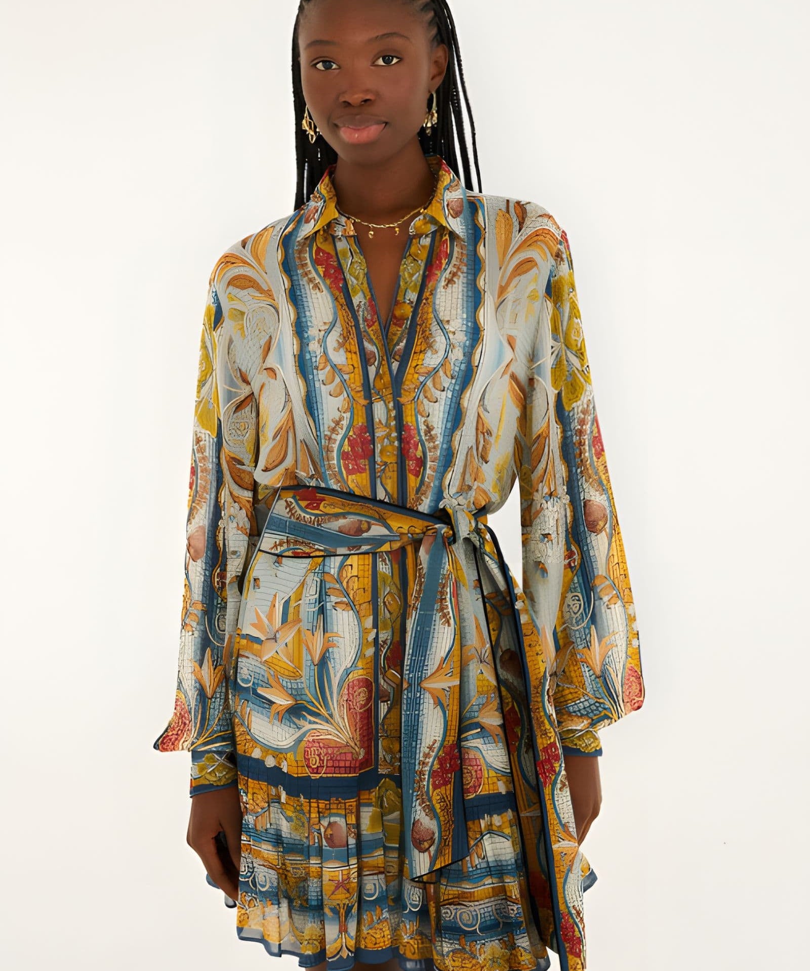 Front view of a model in a studio wearing the Farm Rio Blue Mosaic Garden belted mini dress with long sleeves.