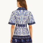Back view of the FARM Rio Blue Porcelain Garden mini shirt dress with all-over blue porcelain floral print
