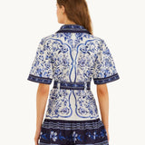 Back view of the FARM Rio Blue Porcelain Garden mini shirt dress with all-over blue porcelain floral print