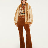 Farm Rio Borbofly reversible puffer jacket with a fawn print – full look with brown flared trousers