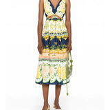FARM Rio Embellished Cutout Printed Midi Dress  view showcasing the artistic print and sophisticated cutout details.