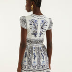 Close-up of the Flowers Arch print on the Farm Rio ruffled mini dress
