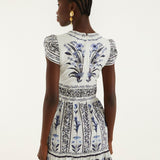 Close-up of the Flowers Arch print on the Farm Rio ruffled mini dress