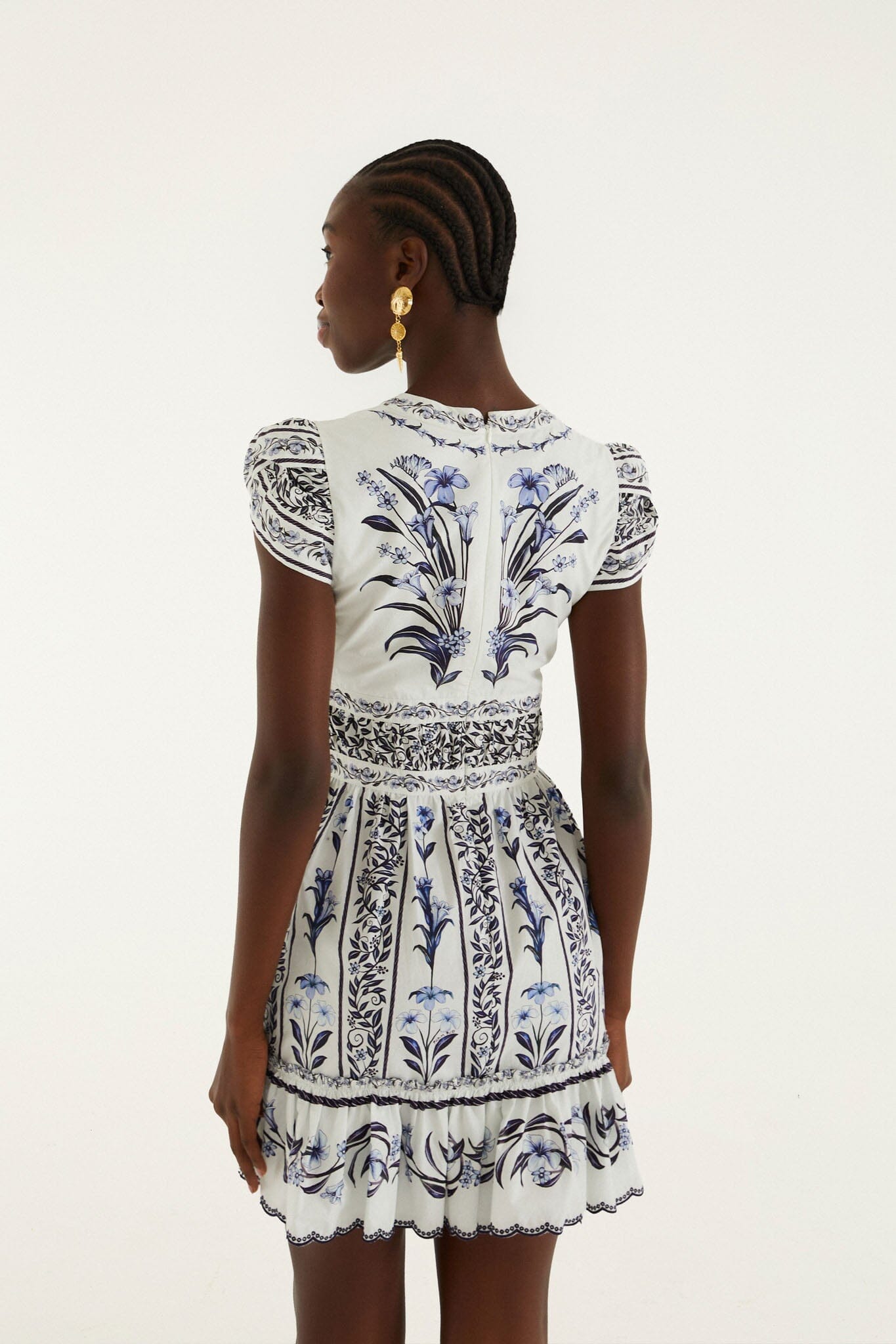 Close-up of the Flowers Arch print on the Farm Rio ruffled mini dress